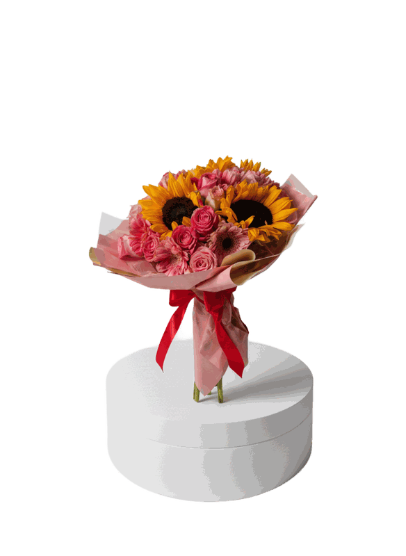 Bouquet de girasoles y rosas rosadas con envoltura coreana